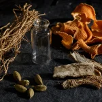 Matières premières végétales de parfumerie : vétiver, écorce d'orange, iris